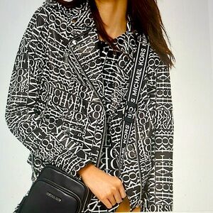 Michael Kors newsprint logo leather Moto jacket